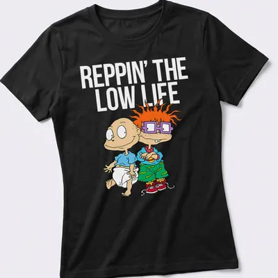 Cartoon T-shirt featuring two playful babies with joyful expressions — printed on a women's shirt