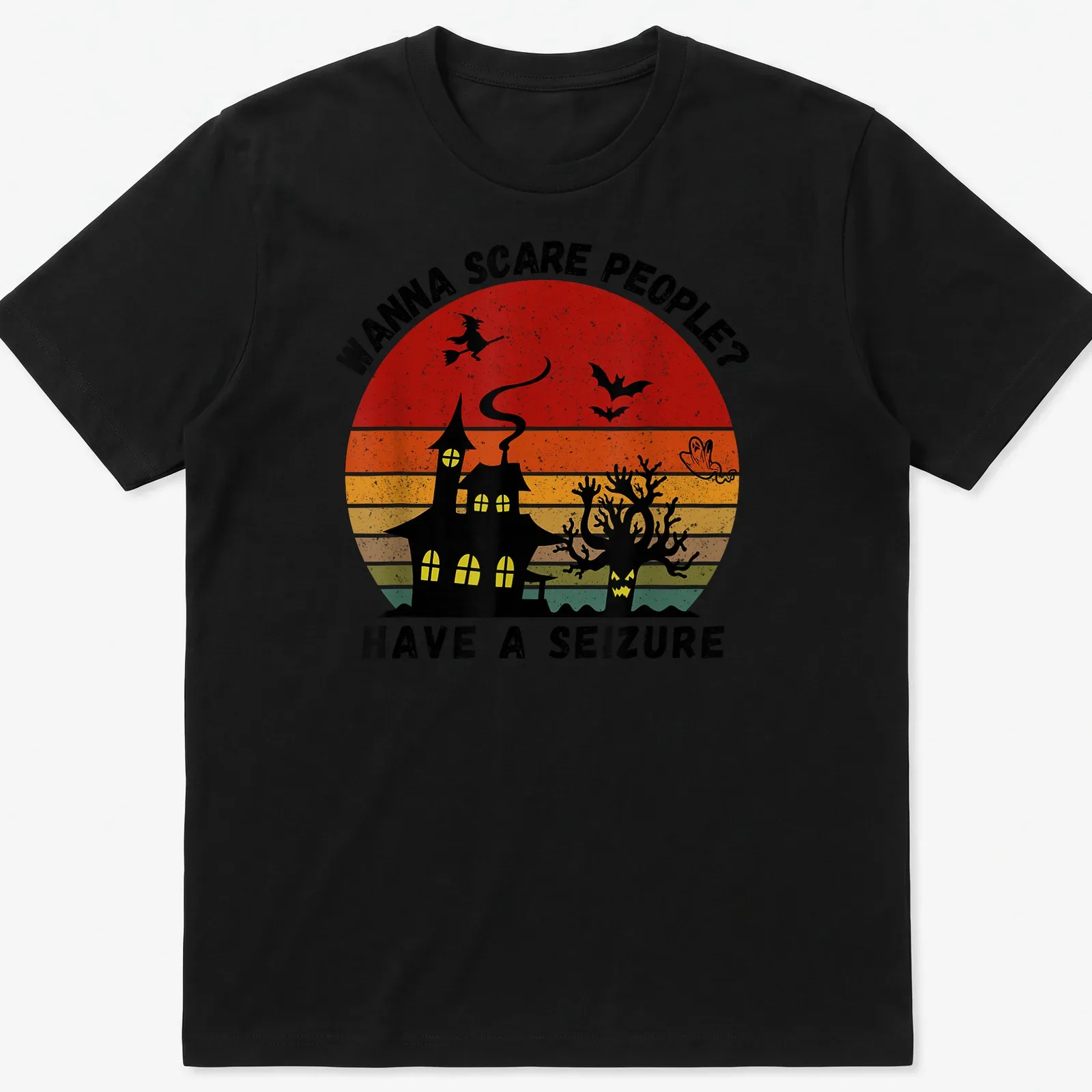 Vintage witch and haunted house graphic with bold printed text in Halloween colors — printed on a unisex t-shirt