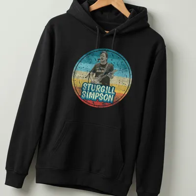 Retro distressed t-shirt featuring humorous text about Sturgill Simpson — printed on a unisex hoodie