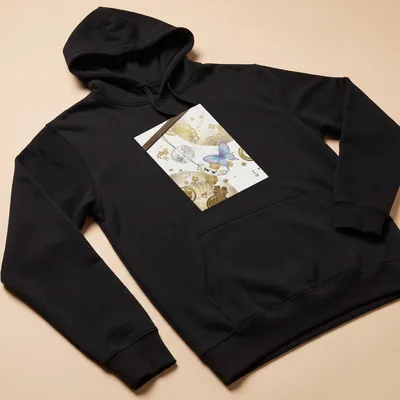 Elegant watercolor design of a butterfly and wind chime in pastel colors — printed on a unisex hoodie