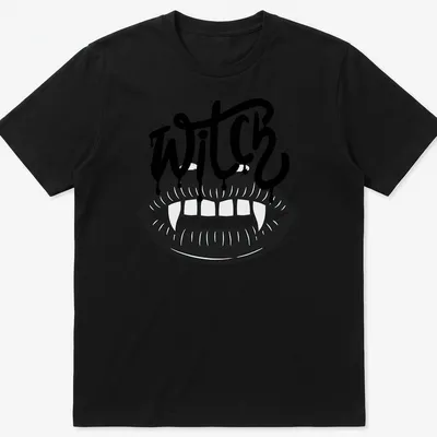 Bold graphic of the word WITCH with vampire teeth in black and white — printed on a unisex t-shirt