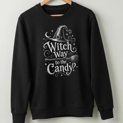 Vintage-style tee with witch hat, broom, and Halloween text — printed on a unisex sweatshirt