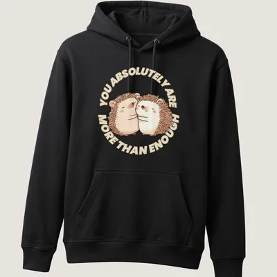 Cute hedgehogs with the text You Absolutely Are More Than Enough in a whimsical illustration. — printed on a unisex hoodie