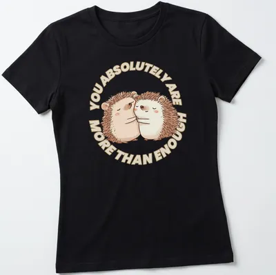 Cute hedgehogs with the text You Absolutely Are More Than Enough in a whimsical illustration. — printed on a women's shirt