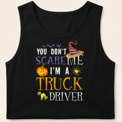 Whimsical Halloween truck driver t-shirt with pumpkin, witch hat, and black cat — printed on a tank top